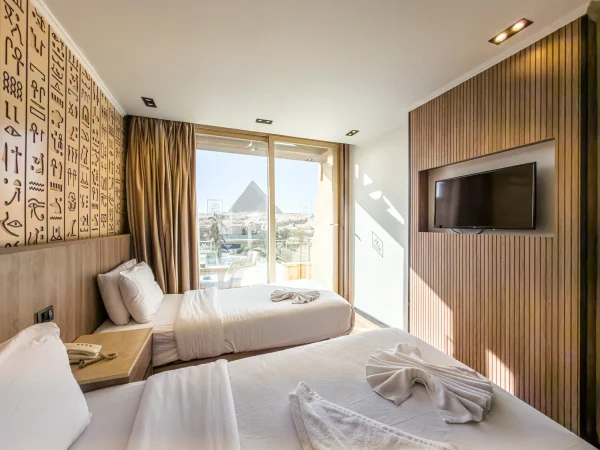 Double Or Twin Room With Balcony- Pyramids View at GreatPyramidInn overlooking the Giza Pyramids